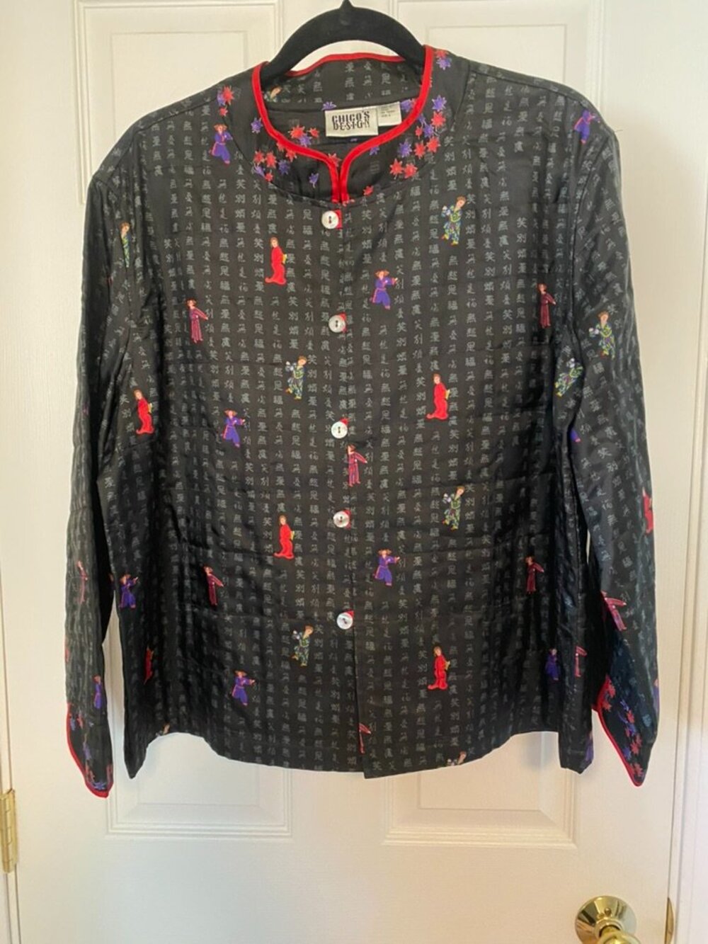 Chico’s size 3 (XL/16), 100% silk mandarin jacket.